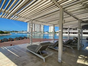 DEPARTAMENTO AMUEBLADO EN ARIA, PUERTO CANCUN, VISTA AL MAR Y LOS CANALES