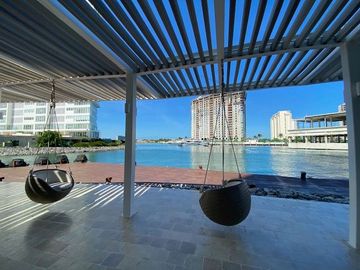DEPARTAMENTO AMUEBLADO EN ARIA, PUERTO CANCUN, VISTA AL MAR Y LOS CANALES