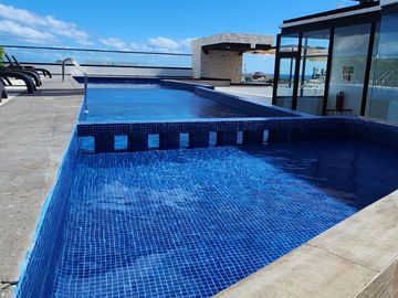 Estudio amueblado: centro de Playa del Carmen, rooftop vista al mar, a pasos de la Quinta Avenida