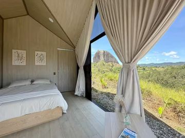 Venta lote con 2 cabañas, (AIrbnb)