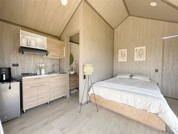 Venta lote con 2 cabañas, (AIrbnb)
