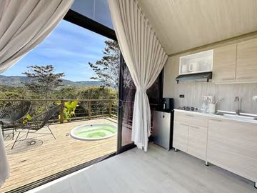 Venta lote con 2 cabañas, (AIrbnb)
