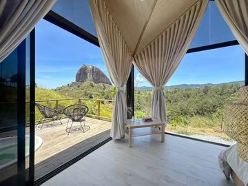 Venta lote con 2 cabañas, (AIrbnb)