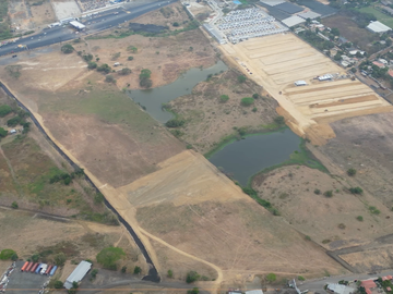 Vendo Terreno 120.000m² pasando peaje Chongón Vía a La Costa 180m de Frente