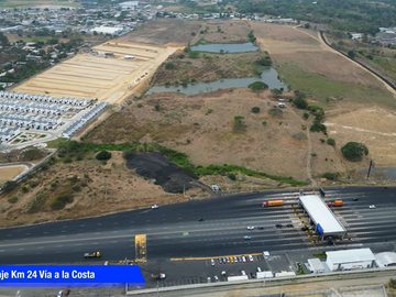Vendo Terreno 120.000m² pasando peaje Chongón Vía a La Costa 180m de Frente