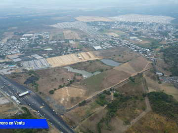 Vendo Terreno 120.000m² pasando peaje Chongón Vía a La Costa 180m de Frente