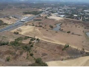 Vendo Terreno 120.000m² pasando peaje Chongón Vía a La Costa 180m de Frente