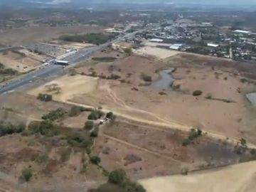 Vendo Terreno 120.000m² pasando peaje Chongón Vía a La Costa 180m de Frente