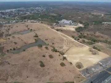 Vendo Terreno 120.000m² pasando peaje Chongón Vía a La Costa 180m de Frente