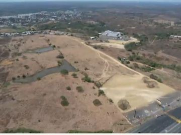 Vendo Terreno 120.000m² pasando peaje Chongón Vía a La Costa 180m de Frente