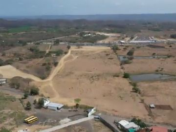 Vendo Terreno 120.000m² pasando peaje Chongón Vía a La Costa 180m de Frente