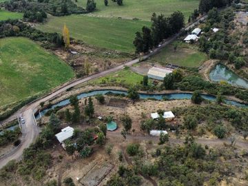 Terreno de 20,28 hectáreas uso agrícola , forestal , turismo, estancia ganadera