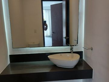Departamento en CANCUN CUMBRES, Planta Baja, grand terraza, frente a la alberca