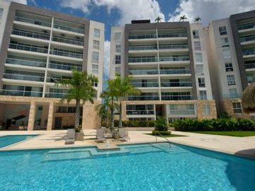Departamento en CANCUN CUMBRES, Planta Baja, grand terraza, frente a la alberca