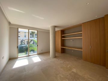 DEPARTAMENTO CON PRECIO DE OPORTUNIDAD EN LUJOSO DESARROLLO EN PUERTO CANCUN, DISEÑO ITALIANO