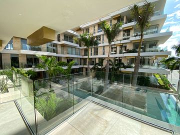 DEPARTAMENTO CON PRECIO DE OPORTUNIDAD EN LUJOSO DESARROLLO EN PUERTO CANCUN, DISEÑO ITALIANO