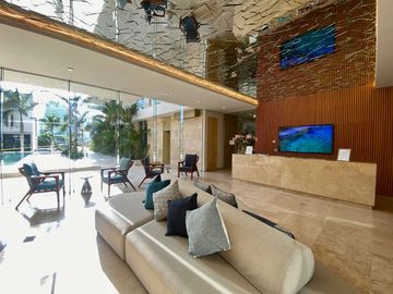 DEPARTAMENTO CON PRECIO DE OPORTUNIDAD EN LUJOSO DESARROLLO EN PUERTO CANCUN, DISEÑO ITALIANO