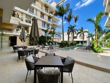 DEPARTAMENTO CON PRECIO DE OPORTUNIDAD EN LUJOSO DESARROLLO EN PUERTO CANCUN, DISEÑO ITALIANO