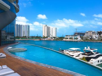 EXCLUSIVO Y LUJOSO DEPARTAMENTO CON PRECIO DE OPORTUNIDAD EN LA ICÓNICA SHARK TOWER, PUERTO CANCUN