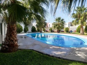 SE RENTA CASA EN RESIDENCIAL LOS ALMENDROS, ALBERCA, PALAPA AYALA MORELOS