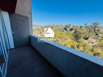 Iluminado departamento con vista panorámica en condominio privado.
