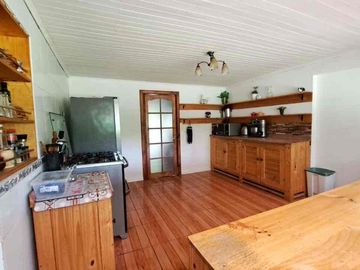 Se vende Parcela con casa en Linares