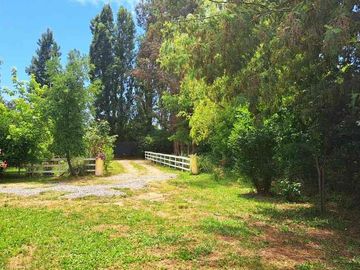 Se vende Parcela con casa en Linares