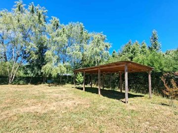 Se vende Parcela con casa en Linares