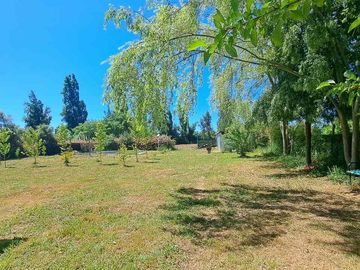 Se vende Parcela con casa en Linares