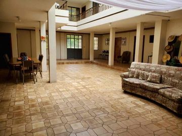 hermosa casa en venta con terreno en venta en paute junto a la vía principal