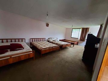 hermosa casa en venta con terreno en venta en paute junto a la vía principal