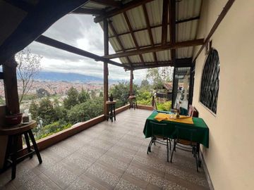 CASA Y AMPLIO TERRENO EN CARMEN DE GUZHO