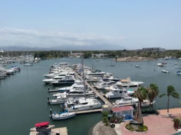 DEPARTAMENTO DE LUJO EN VENTA EN LA MARINA DE NUEVO VALLARTA VISTA DIRECTA A LA MARINA A SOLO 50 PASOS DEL MAR SIN CRUZAR CALLES