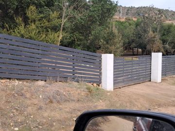 Vendo terreno de 6.000m2 con casa en Condominio Los Maitenes.