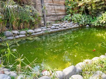 Casa de campo con jardín, chimenea y jacuzzi en Chaclacayo