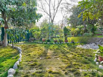 Casa de campo con jardín, chimenea y jacuzzi en Chaclacayo