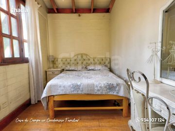 Casa de campo con jardín, chimenea y jacuzzi en Chaclacayo