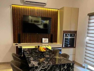 Casa equipada en venta en Bonaterra Hermosillo, modelo Gea con 3 recámaras, cocina con isla, patio y acceso a alberca, juegos y área social con asador