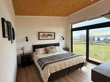 casa con hermosa vista al lago en condominio en sector Los Riscos de Pucon
