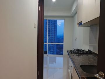 Sewa Apartemen Puri Mansion Studio Semi Furnish Terjangkau
