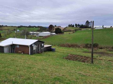 Vende Parcela con casa y Bodega en San Agustin camino costero Calbuco Puerto Montt