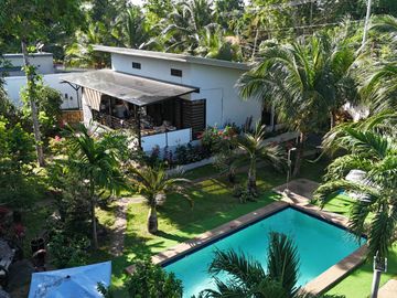HOUSE AND LOT WITH SWIMMING POOL INCOME GENERATING FOR SALE IN PANGLAO ISLAND OF BOHOL