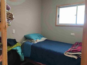 Gran Oportunidad en Totoralillo: Terreno con Casa Principal y Cabañas de Arriendo
