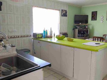 Gran Oportunidad en Totoralillo: Terreno con Casa Principal y Cabañas de Arriendo