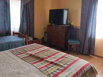 Gran Oportunidad en Totoralillo: Terreno con Casa Principal y Cabañas de Arriendo