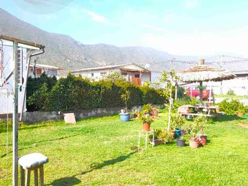 Gran Oportunidad en Totoralillo: Terreno con Casa Principal y Cabañas de Arriendo