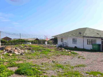 Gran Oportunidad en Totoralillo: Terreno con Casa Principal y Cabañas de Arriendo