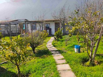 Gran Oportunidad en Totoralillo: Terreno con Casa Principal y Cabañas de Arriendo