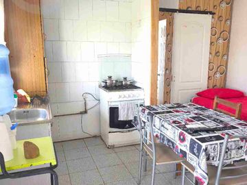 Gran Oportunidad en Totoralillo: Terreno con Casa Principal y Cabañas de Arriendo