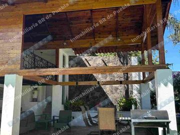 VENTA DE CASA  CON ALBERCA PALAPA Y CABAÑA  EN LA MORALEDA ATLIXCO cerca de topolino tiene pozo ideal para casa de descanso o inversión para rentarla fines de semana o Airb&b y recuperar inversión o rentar ccomo jardín de eventos  bodas 15 años bautizos etc